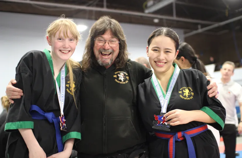 Russ Martin - Instructor - with with students who have won medals