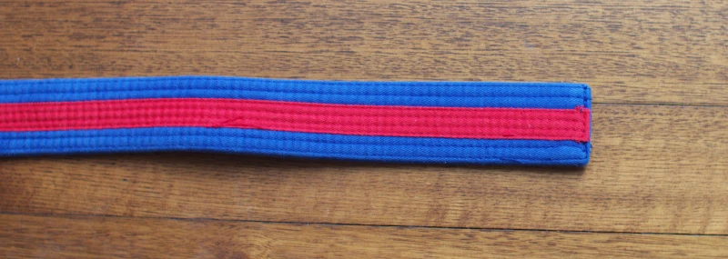 belt-blue-red-tag Blue with red tag belt