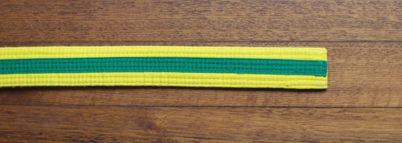 Yellow with green tag belt
